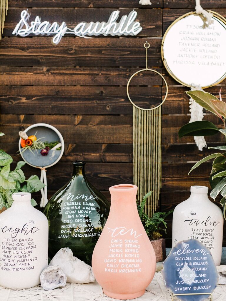 Calligraphed clay pots as seating chart