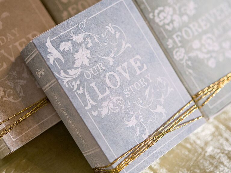 'Our Love Story' in vintage white type on faded gray book box cover