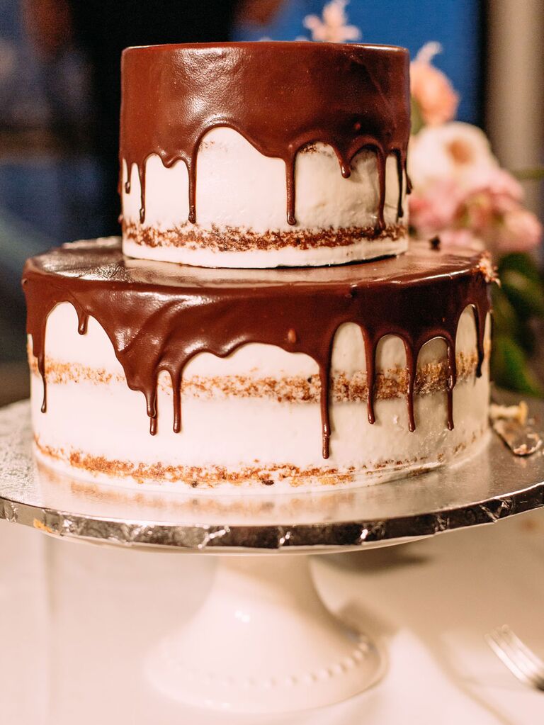 Two-tier semi-naked rustic wedding cake with chocolate ganache drizzle