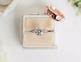 classic round solitaire engagement ring in a ring box