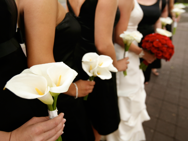 Bridesmaids wearing black dresses