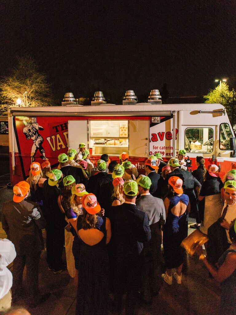 Guests gather around a food truck for a late night bite. 