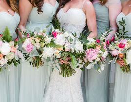 Bride with bridesmaids holding bouquets