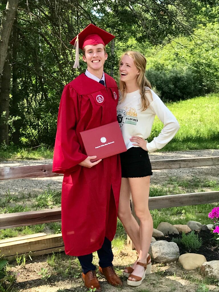 Austen's virtual graduation. He graduated with his bachelor's in Economics. Jenna was so proud of him. 