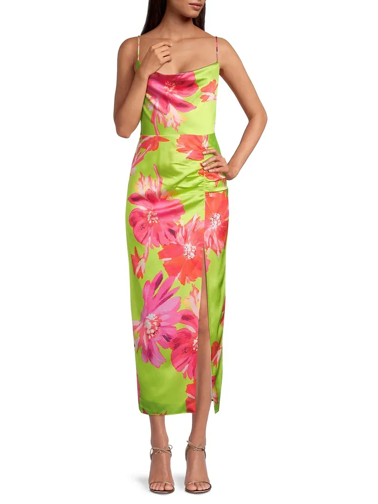 green satin dress with pink floral print and spaghetti straps