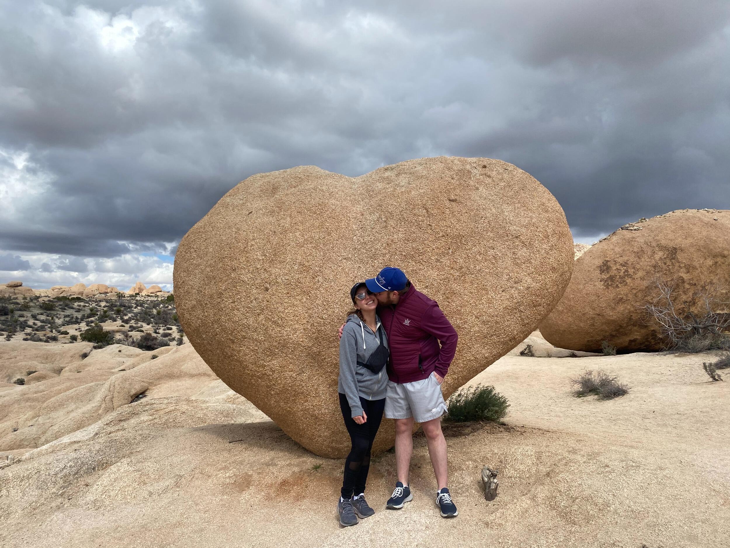 The ladies who took this picture wouldn't let us leave until we kissed in front of the rock. 
