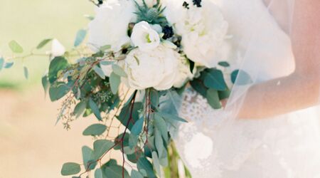 Babies breath and twine boutonniere Lighthouse Flower Shop