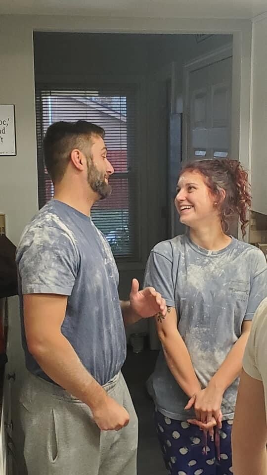 Stephanie had her family tradition of cut out Christmas cookies, which always ended in a flour fight. Her dad caught this photo of them without them knowing. 