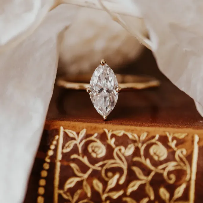 Marquise solitaire engagement ring from Sarah O.