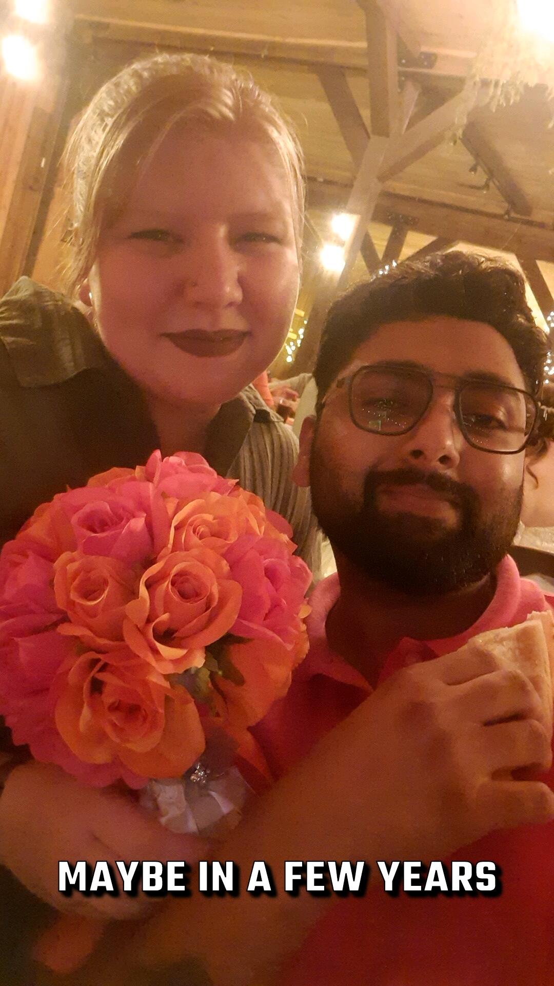 Our first wedding as a couple and we caught the bouquet and the garter