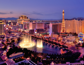 City skyline at night with Bellagio Hotel water fountains in Las Vegas, Nevada