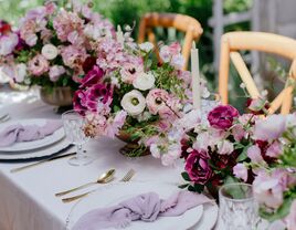 Beautiful purple flower decoration on the reception table