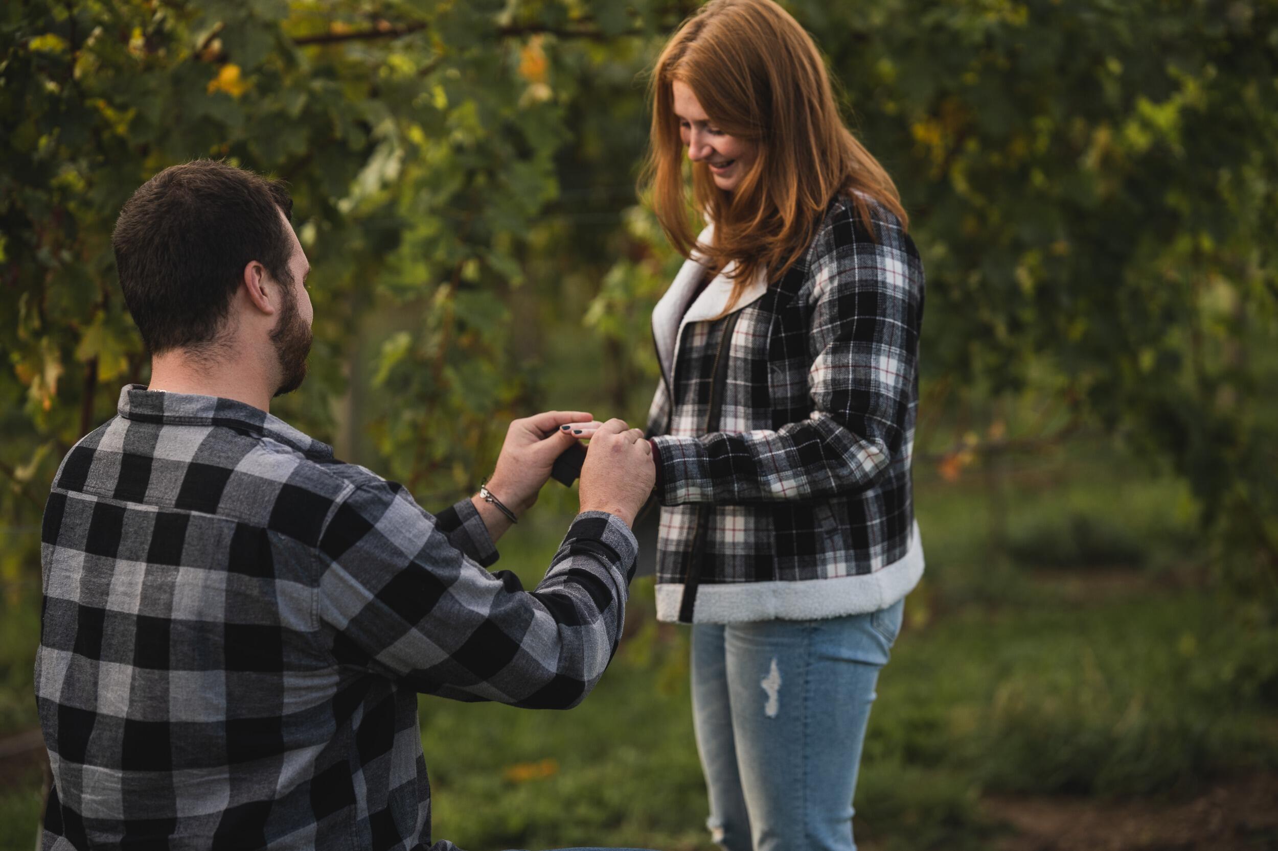 This day started off as a hectic morning where Nate and Chase were getting ready to travel to Cayuga Lake to visit some wineries with friends. Nate asked Chase what he should wear and she responded "I don't know, we are just going wine tasting put on a flannel or something". Which then led to them matching. They had gone to a few wineries before their final destination, Quarry Ridge Winery. Once they got to the winery Chase just thought they were meeting up with their friend's sister, who was doing photography work for the winery.... She was not there to do photography work for the winery. She was there specifically to photograph the proposal. When Nate finally got Chase there, Nate was trying to figure out a way to get everyone outside and taking pictures without being obvious. That is when Chase asks if someone could take a photo of her and Nate. Then I think you know what happened next....

It was a beautiful day and perfect proposal. Thank you to everyone that was involved!