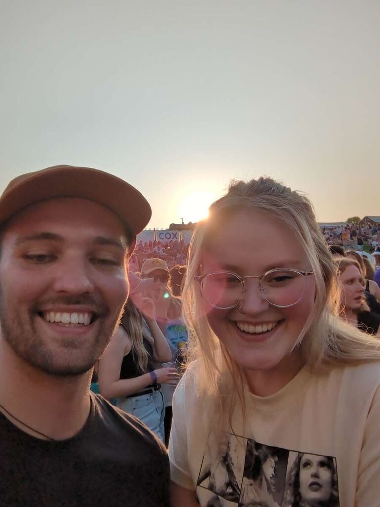 On a whim, Megan reached out to Bryan the morning of July 23 to see if he wanted to go to a Noah Kahan concert in Council Bluffs, IA. They had only hung out a few times before, but Bryan knew he didn’t want to miss this chance. Just before the concert began, he asked Megan if she considered it a date. She, of course, said yes!