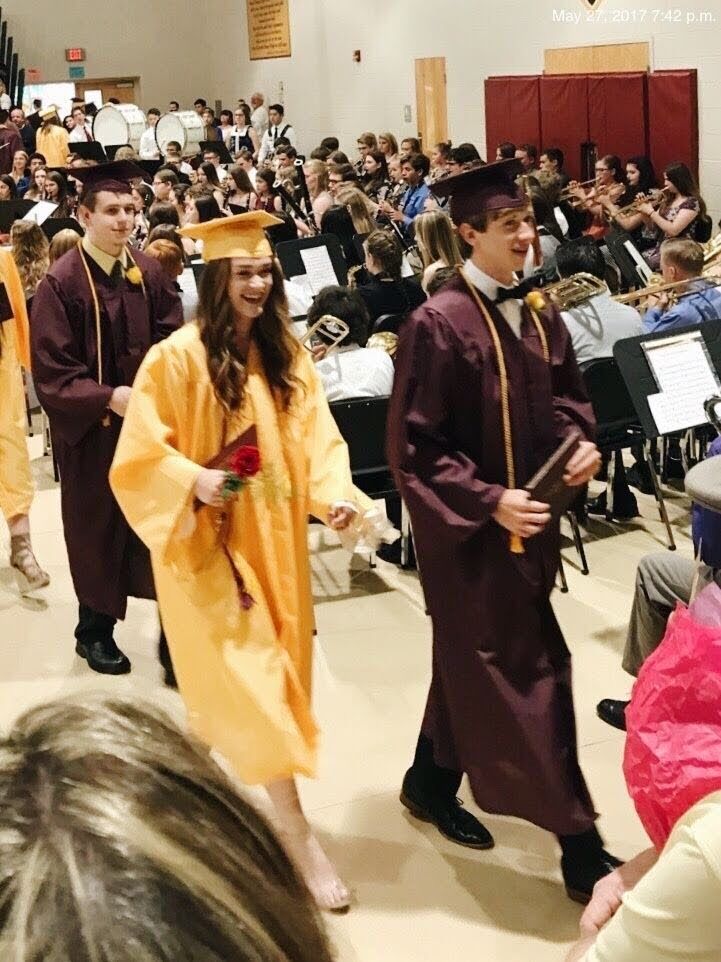 Graduation! We even walked out of graduation together, which was based on height and rotated male/female, what are the odds we were placed next to each other?!