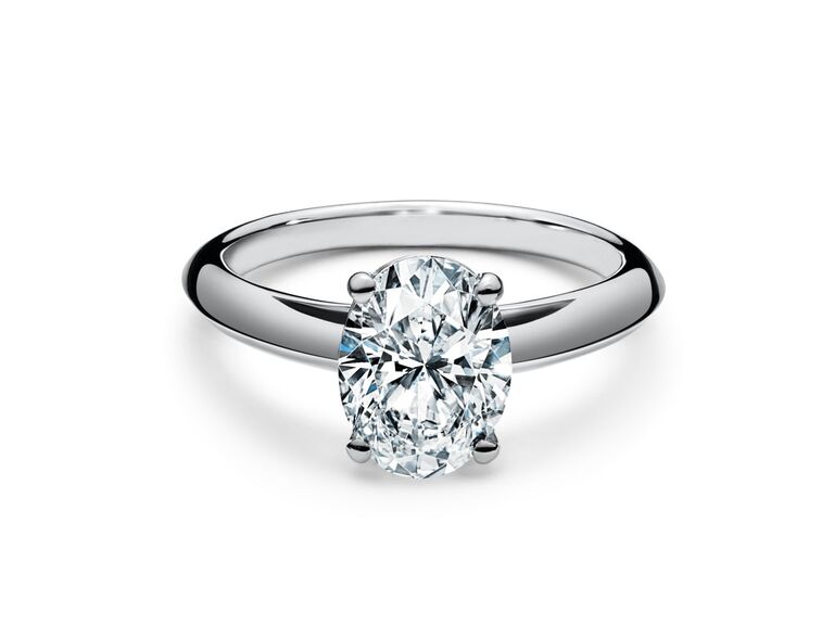sparkly classic oval engagement ring with platinum band