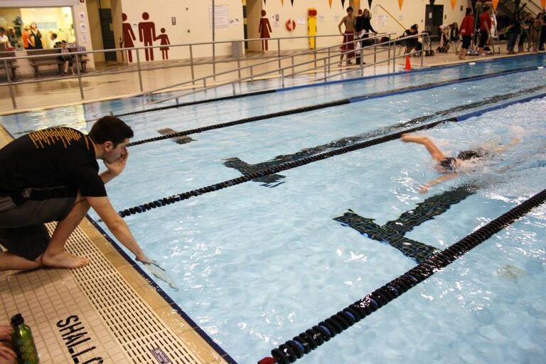 Many hours were spent on the pool deck cheering each other on, even through a long 1500