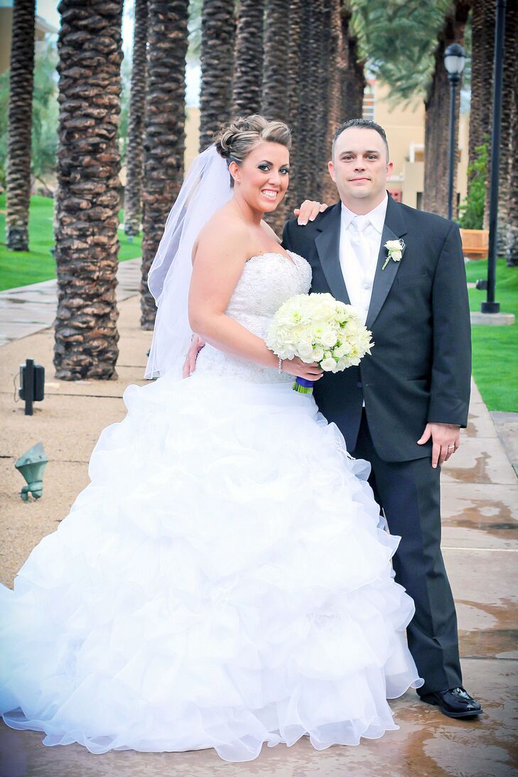 ivory wedding dress and white groom shirt