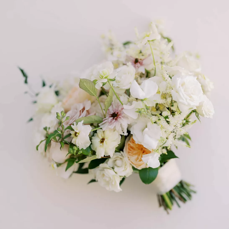 Sweet pea and butterfly ranunculus wedding bouquet