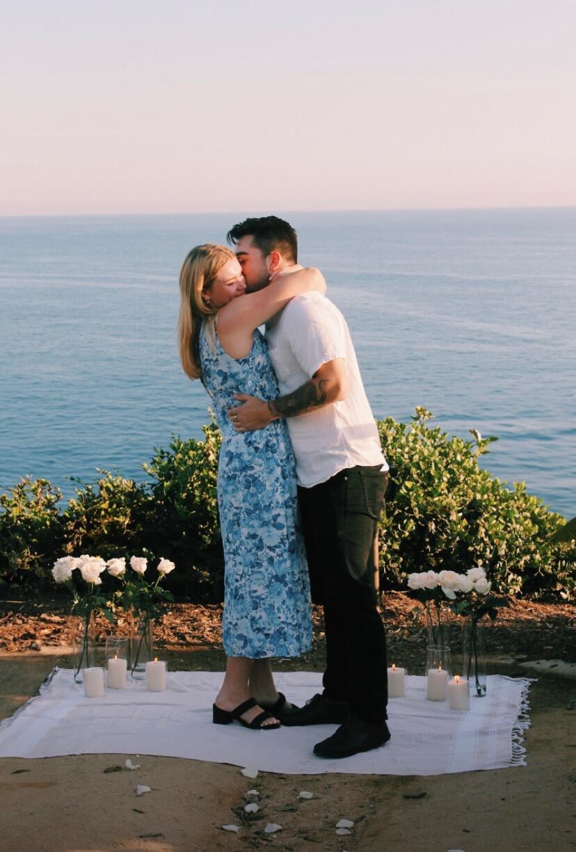 WE'RE ENGAGED! The BEST day of our lives thus far. Patrick took Kristine to Laguna Beach for "her birthday," but it turned into a much bigger surprise. Kristine's parents, her friends, and Jenny were all there to be a part of this sweet moment. 