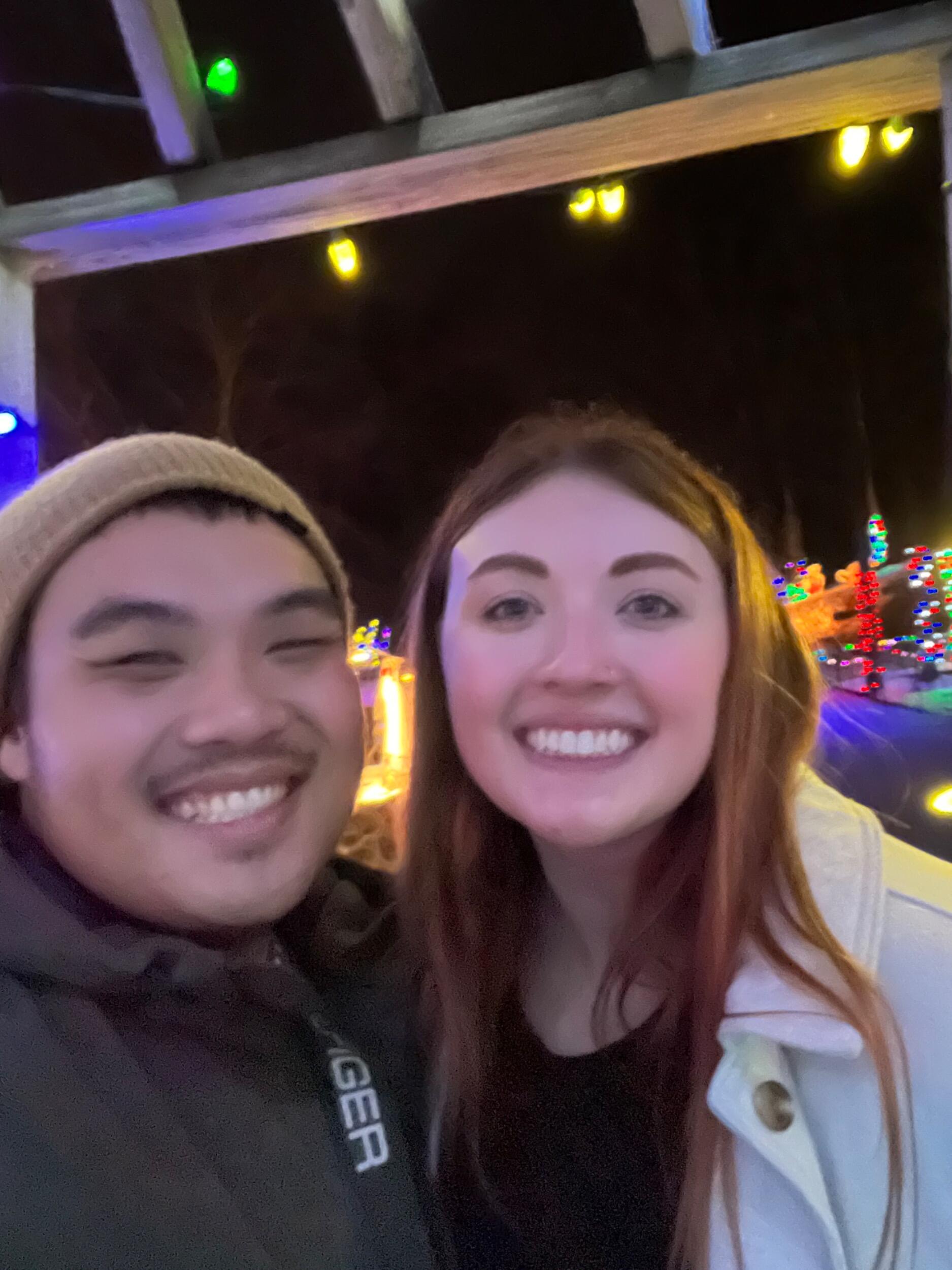 Enoch and Sophia had their first date December 11, 2022.  On their first date, they went for sushi where shortly after partaking in a water chugging contest…Sophia threw up!  Miraculously Enoch still liked her and here we are now—we’re getting married. Lol. To prevent the awkwardness, Enoch played careless whisper to which Sophia turns over her shoulder in confusion and mutters “Is this careless whisper??”.  To which Enoch replies, “Yeah!  I didn’t want you to feel embarrassed, so I wanted to make you laugh instead!” 

It was in this moments that Sophia thought to herself, “Yup…. I just met my future husband.”  

They continued their adventure despite the unexpected events after making a quick stop at Walgreens for some tums.  After some drinks, games, and conversation, they didn’t want the fun to end!  

So, off to the Christmas Lights they went!  Wandering through a winter wonderland, playing on the playground, arm wrestling as an excuse to hold hands, they stumble upon a simple turtle statue where they decided to snap their very first picture together!   (This part of the story is foreshadowing, you’ll want to remember this part. ;) ). 