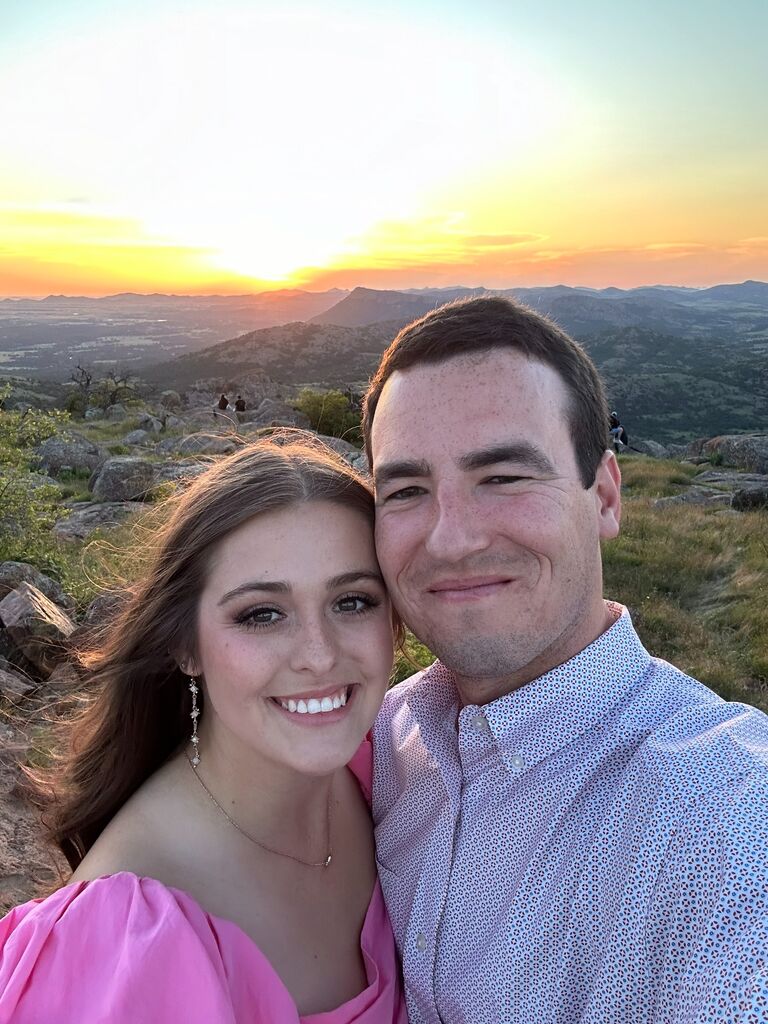 Taking engagement photos at sunset 