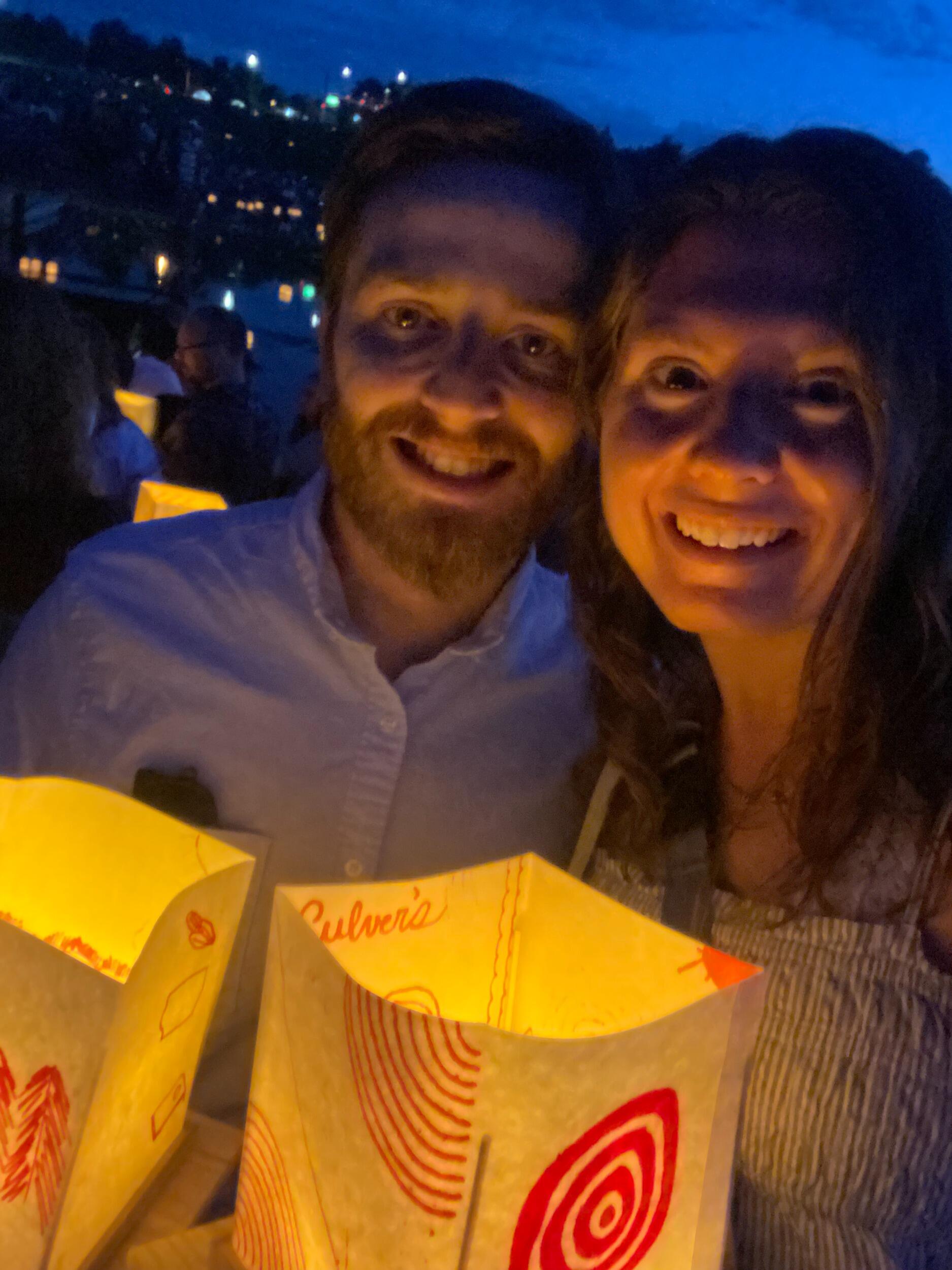 Our first photo together at the Water Lantern Festival. This was our fifth date. On our first date, we talked for 5 hours straight, and we both got home after midnight.