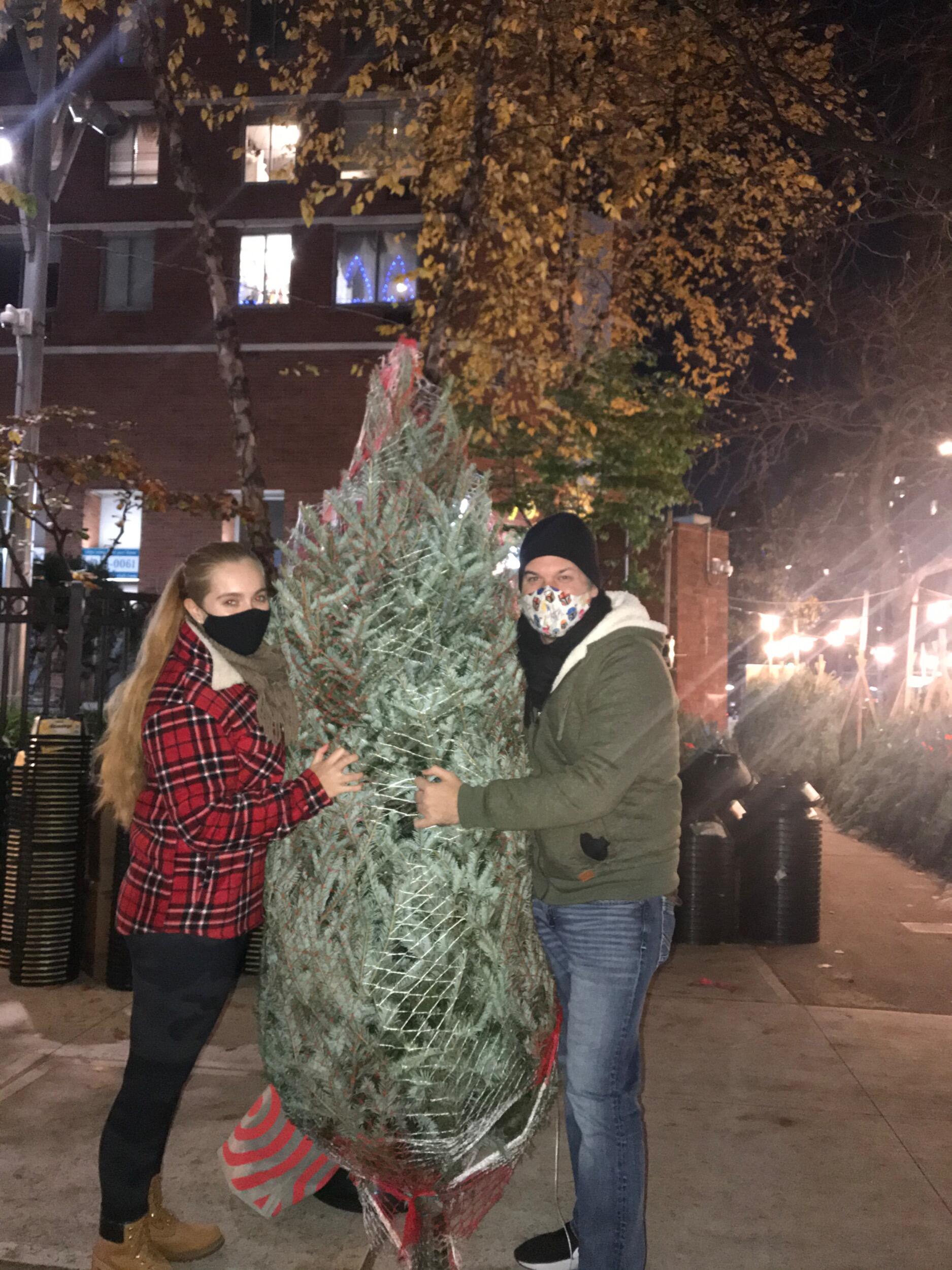 After searching the cold city streets, Pilar and Mike buy their first Christmas tree together. Mike may or may not have hurt his back carrying it all by himself back to the apartment. What a gentleman.