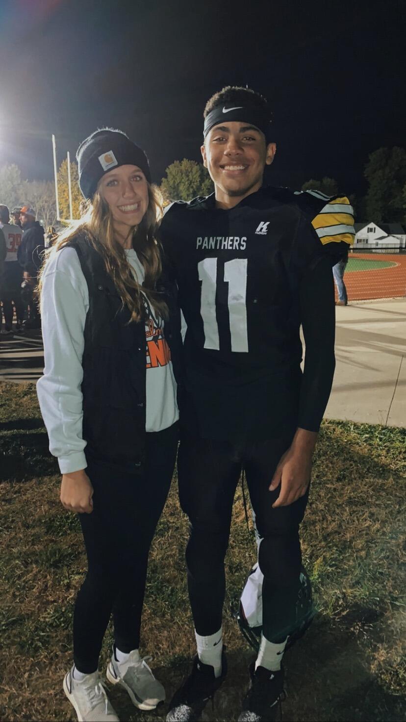 Josh and Katy met at a waterpark called the Landing in Monroe City, Missouri when they were 15 years old. Josh introduced himself to Katy saying, “Hi, my name is Joshua Talton and a fun fact about me is I have a twin brother.” Katy followed Josh on Instagram, and Josh then DMed her. This is Josh and Katy's first picture together at his football game. Katy attended many of Josh's games despite him going to Monroe City and her going to Palmyra (big rivals). 