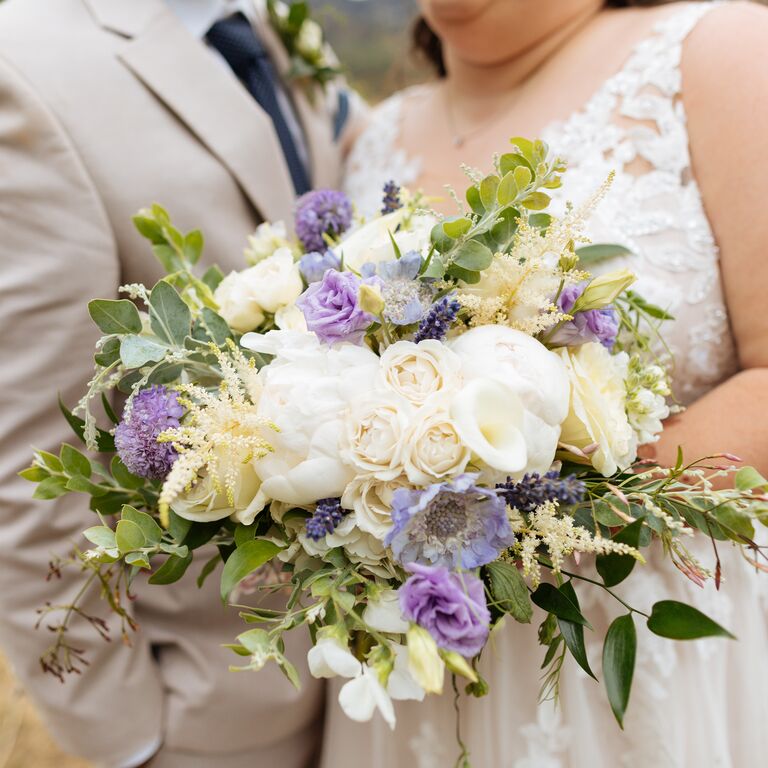 Purple and white wedding bouquet fit for royalty