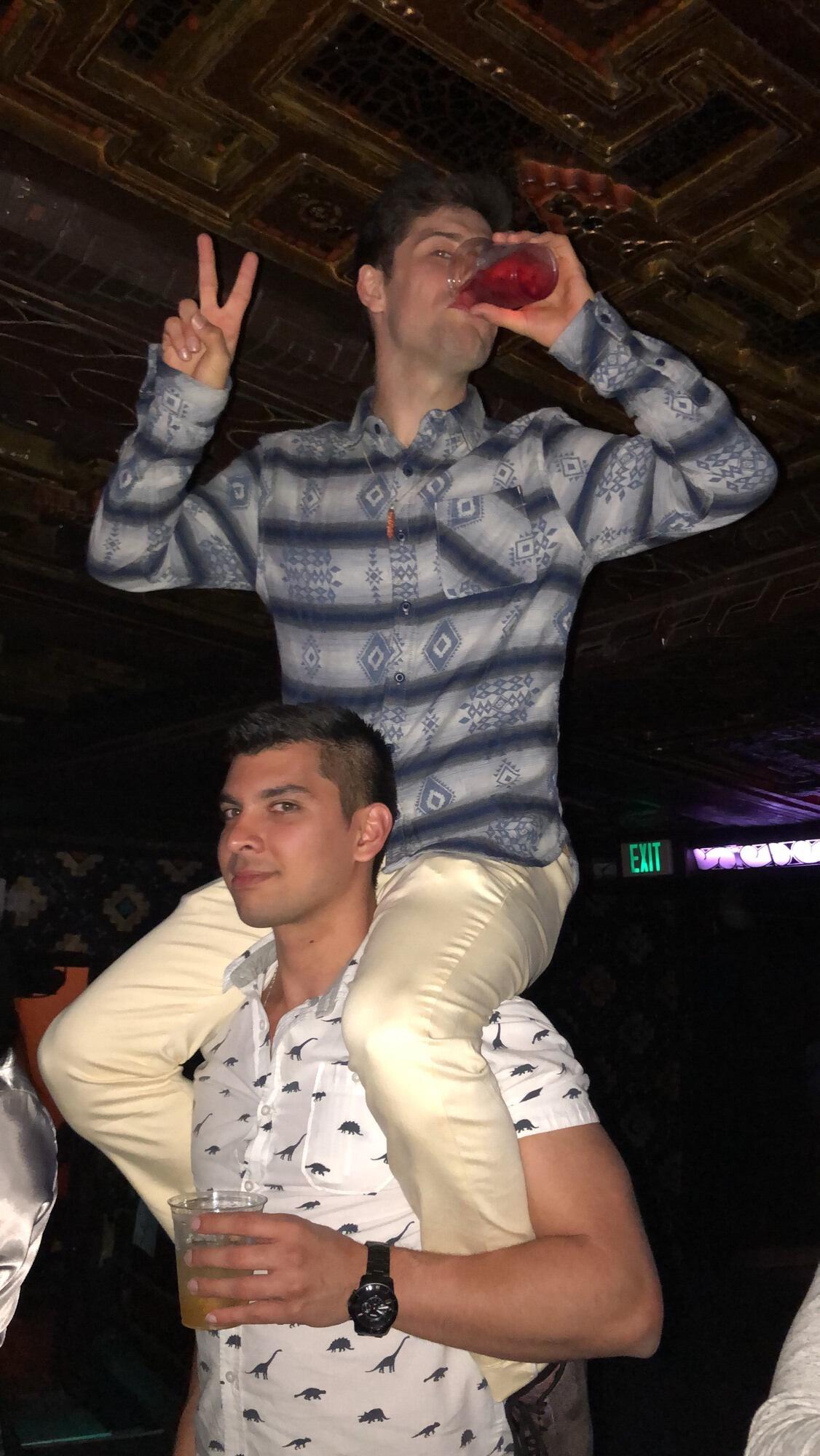 Skyler helping Jojo see the underground wrestling match with a vodka cranberry and whiskey! 
