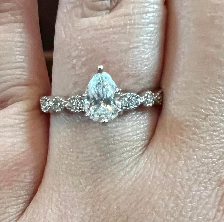 The ring! 

Gavin customized the band and setting. The diamond is the same one that his parents' used when they got engaged! Thanks Bryan and Stacey!