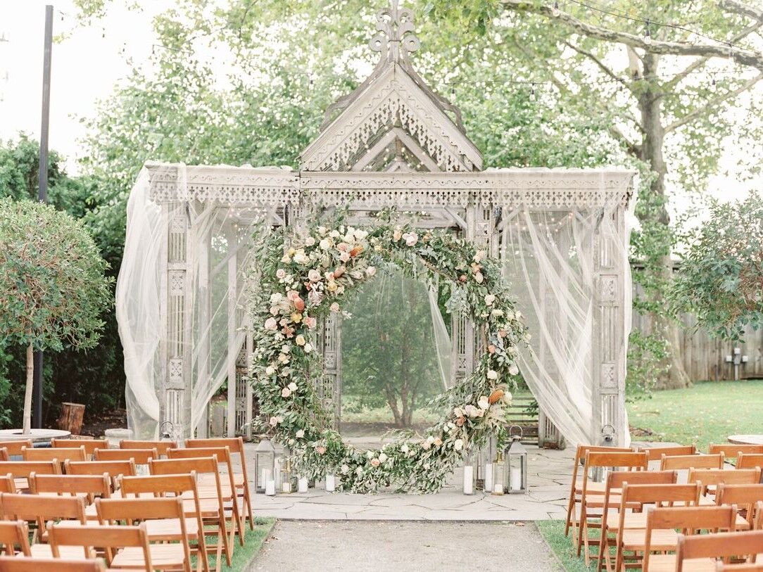 Cicular floral wedding ceremony arch