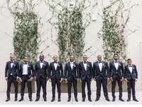 Junior groomsmen with groomsmen in wedding party.