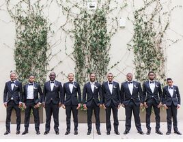 Junior groomsmen with groomsmen in wedding party.