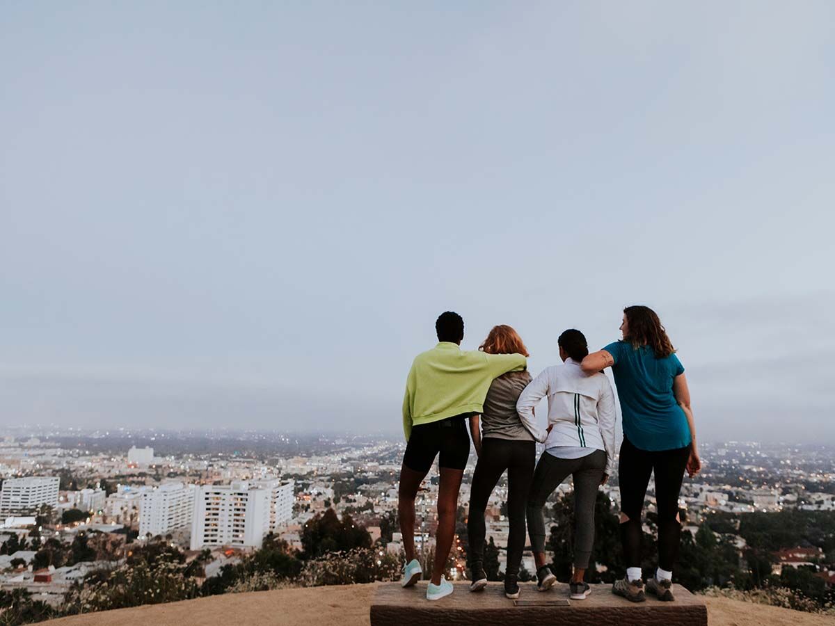 A Los Angeles Bachelorette Party - four woman standing on a los angeles hilltop