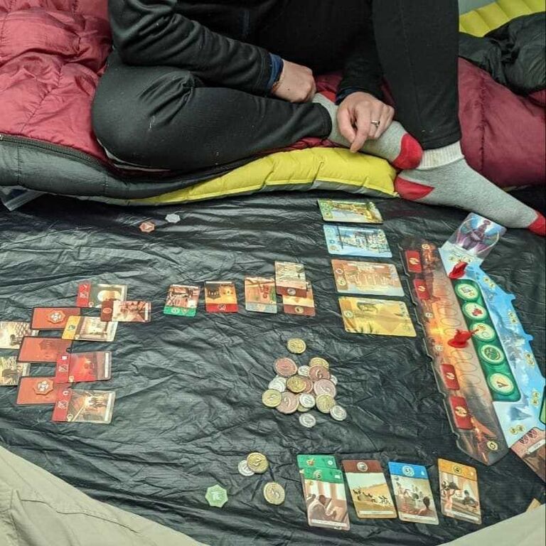 Of course we played board games too! Even if it was in a tent.