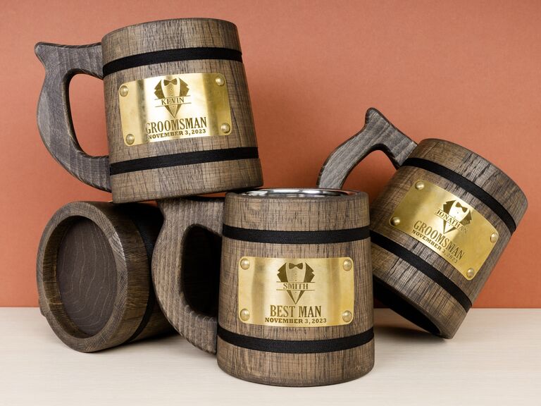 Four wooden tankards with gold plates for Groomsmen and the Best Man from Etsy
