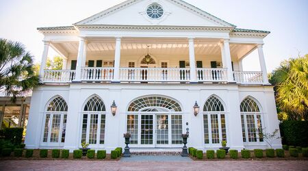 A perfectly timed winter wedding at Lowndes Grove that's all aglow, Charleston, SC