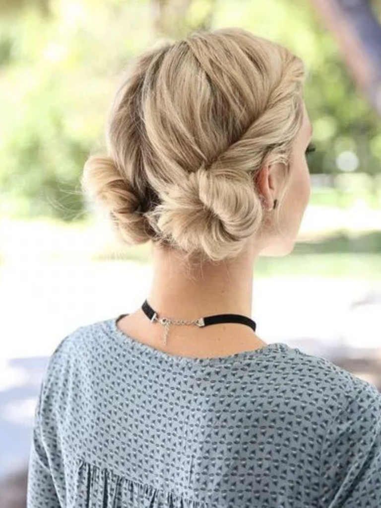 Space buns wedding guest hairstyle