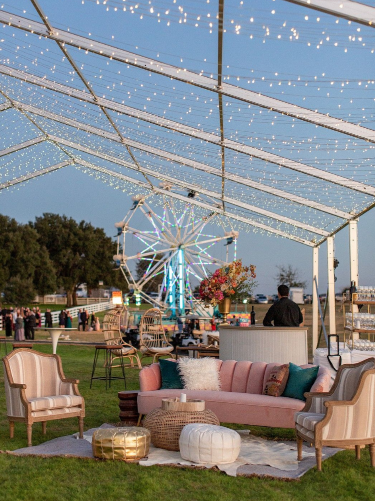 Reception with lounge seating and Ferris wheel