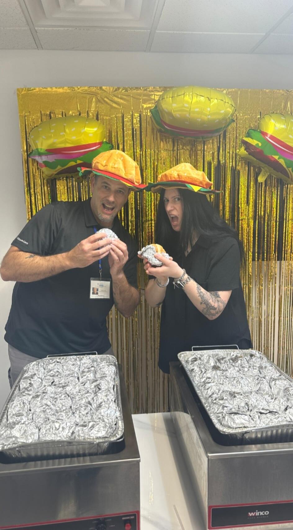 Keith and his boss Sonia celebrating International Burger Day at work! Can you tell he loves his job! LOL 