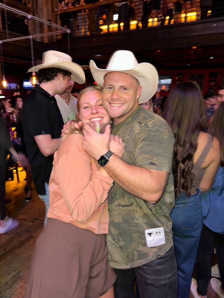 After about a month of "talking," Katie invited Matt to go to Nashville with some friends for the Colts vs. Titans game. We still don't know if he went to spend more time with Katie or if he wanted free Colts tickets...