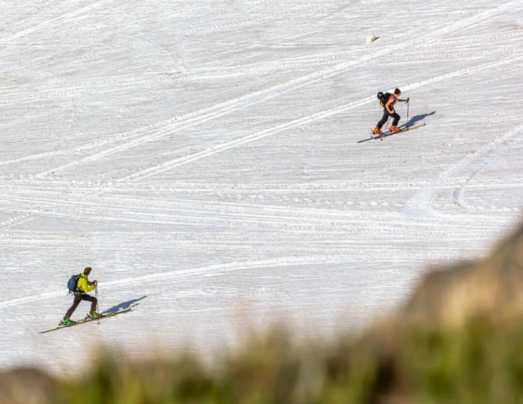 Reunited somewhere different this time, the Gardner Head Wall outside Red Lodge MT in July! Hannah's first time skiing it - skinning back up to our cars, Hannah is winning