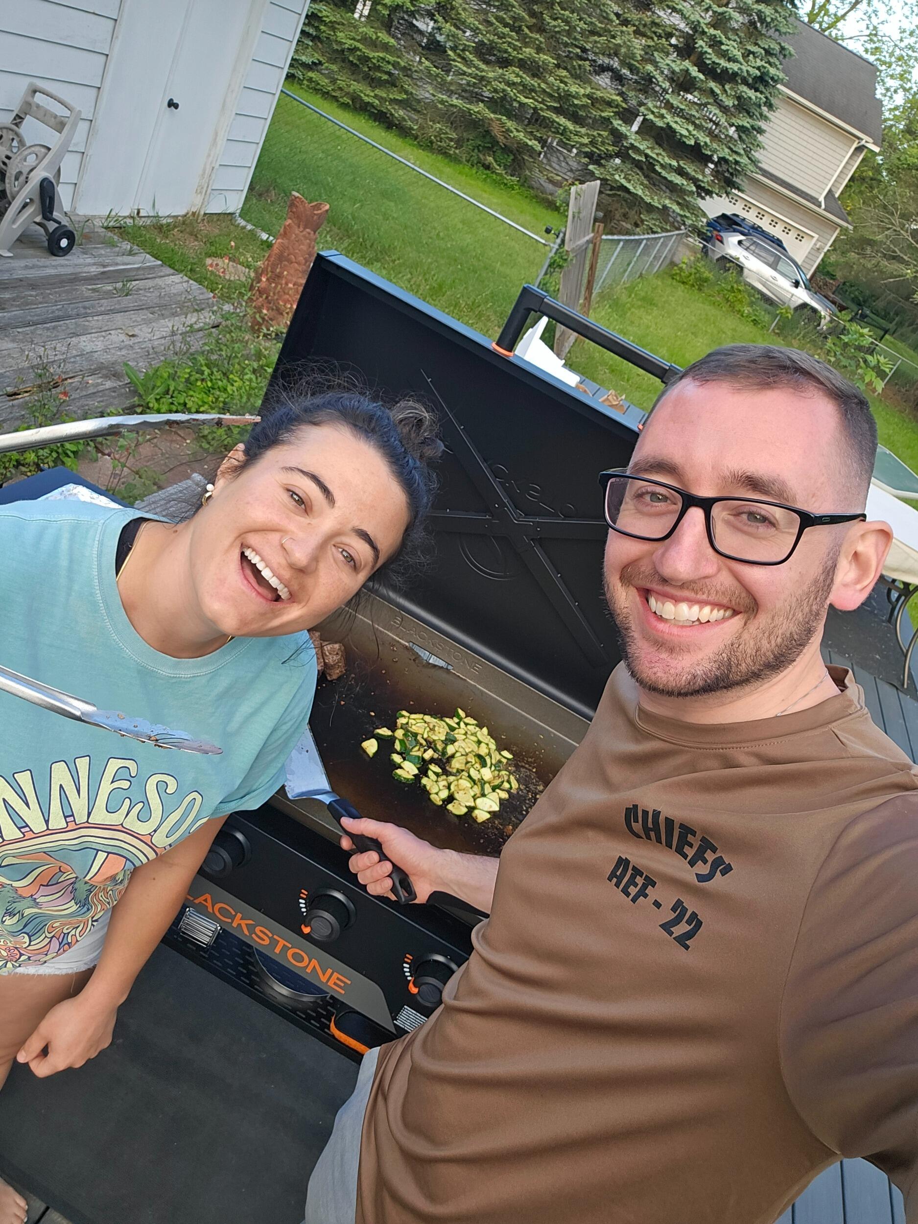 Grilling together on the grill Allyssa got Jeremy. The first time of many!