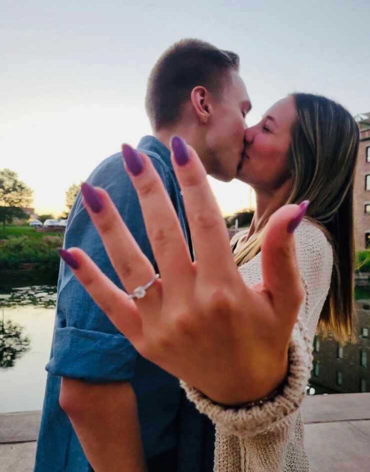 The day Julia said "YES!" Michael proposed after they went out for dinner at their favorite place, Crave in Sioux Falls. Our friend Kyler Statema took the best sunset engagement pictures for us :)