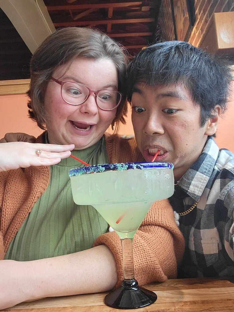 Sharing a margarita at La Casa Maya for Victoria's birthday.