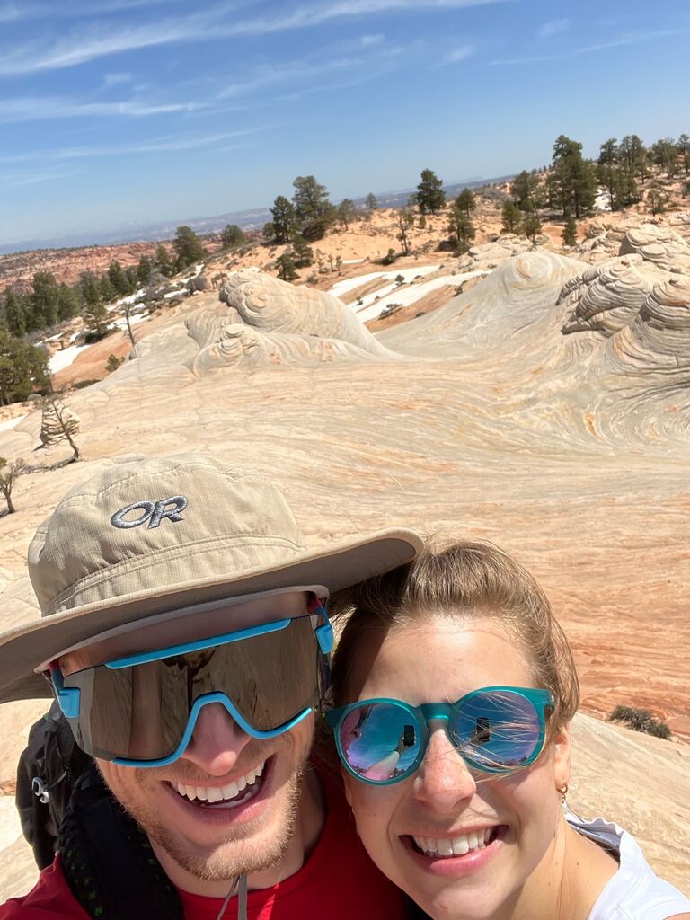 Bailey and Ian explore southern Utah. The view in this pic was worth Bailey losing a battle to a cactus.