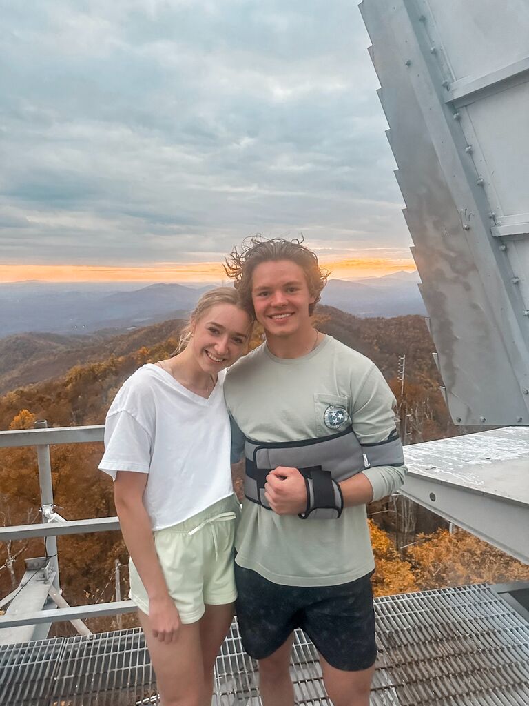 Our first picture together! Two weeks after Josh had shoulder surgery... and we hopped a fence and climbed up here (oops)