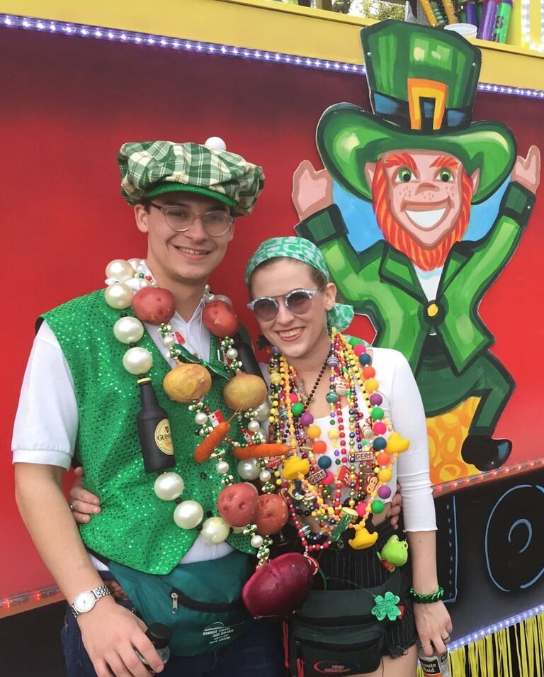 Nick and Cat walk in the St. Patrick's Day parade in Baton Rouge. 